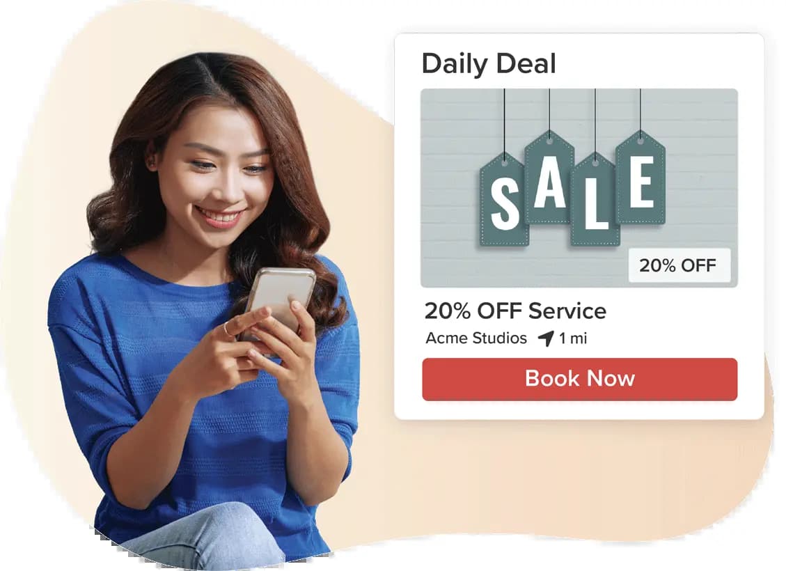 A picture of a customer on a tablet shopping for daily deals on Vagaro's salon, spa and fitness software & marketplace.