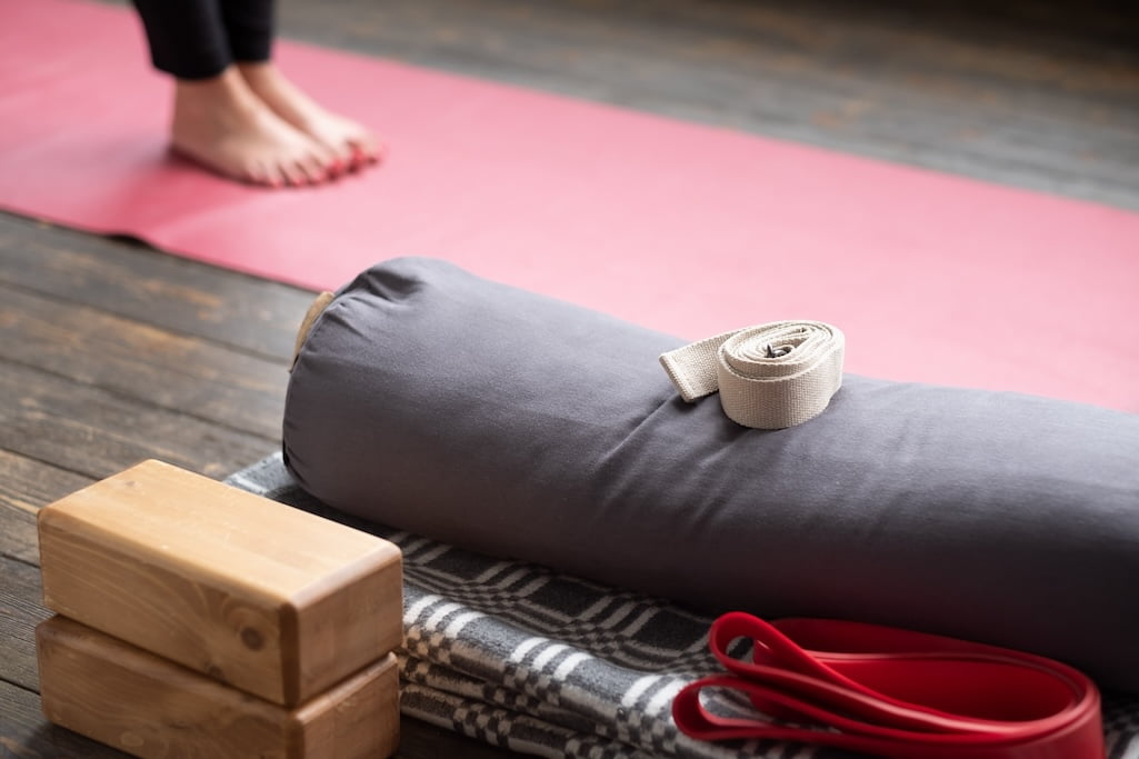 caucasian-females-legs-on-yoga-mat-with-yoga-props-2025-01-10-15-08-23-utc.jpg