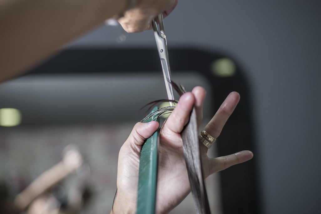 a-hairdresser-in-action-cutting-long-hair-2025-01-08-10-14-53-utc.jpg