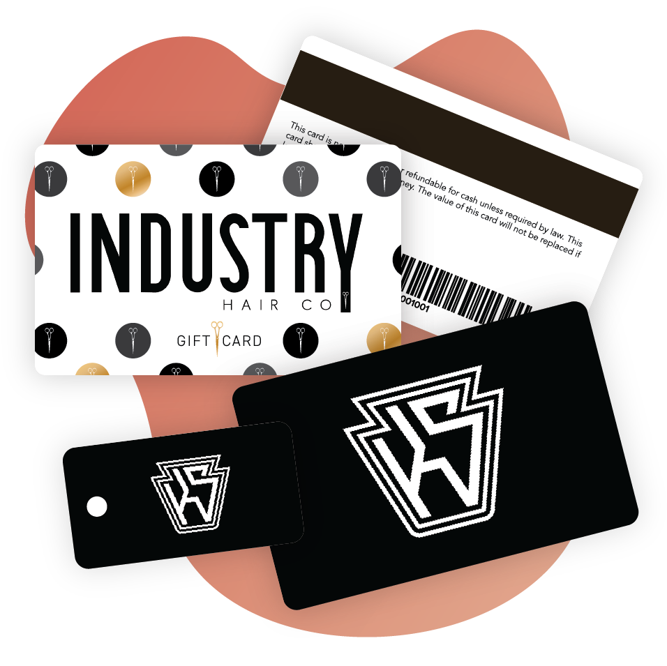 An image of branded gift cards and membership cards that can be made within Vagaro's salon, spa and fitness software.